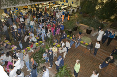 About 400 people, many of them in PJs, gathered in the Fermilab atrium