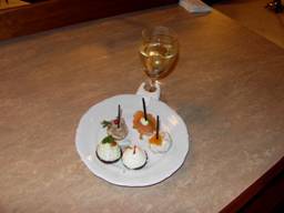 The fare. Note the clever wineglass holder.