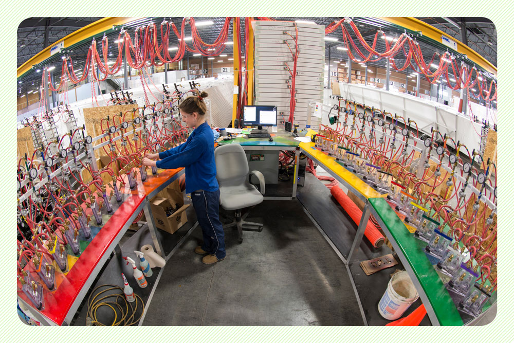 Photo of a student checks pressure gauges