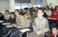 Students around the world participate in videoconferences, lectures, and analysis of particle physics data.