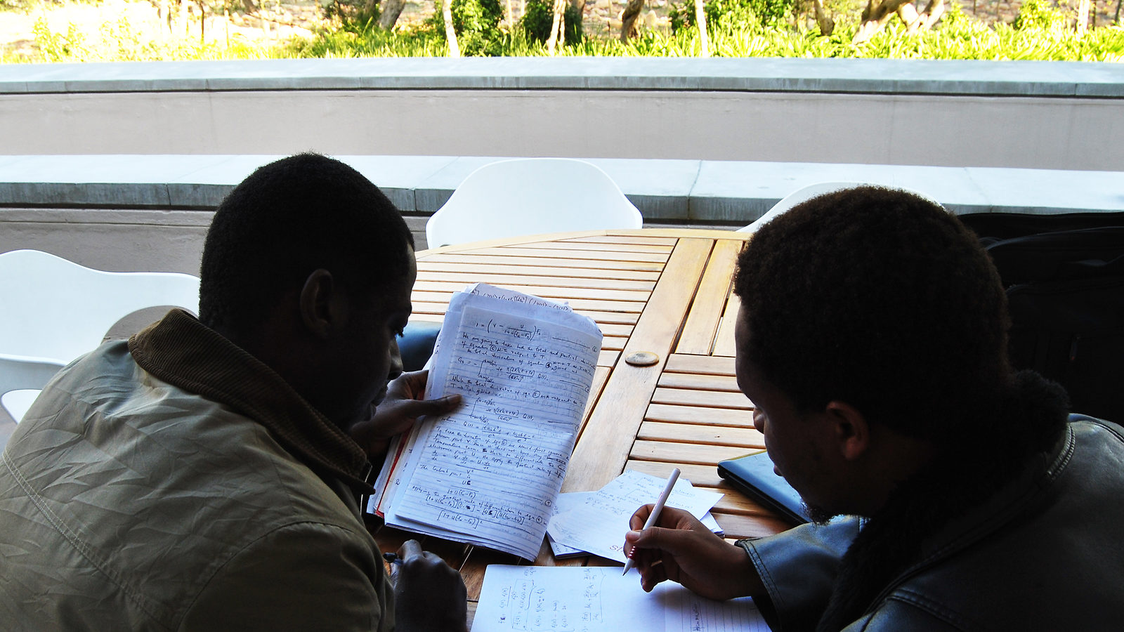 Students working on equations