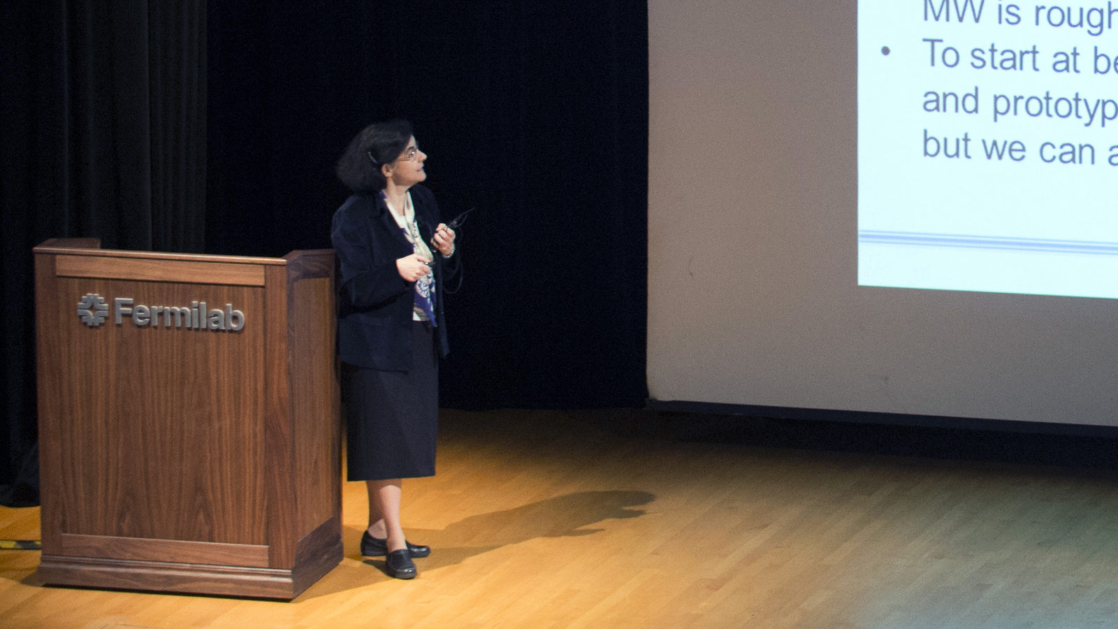 Photo of physicist giving speech at Fermilab