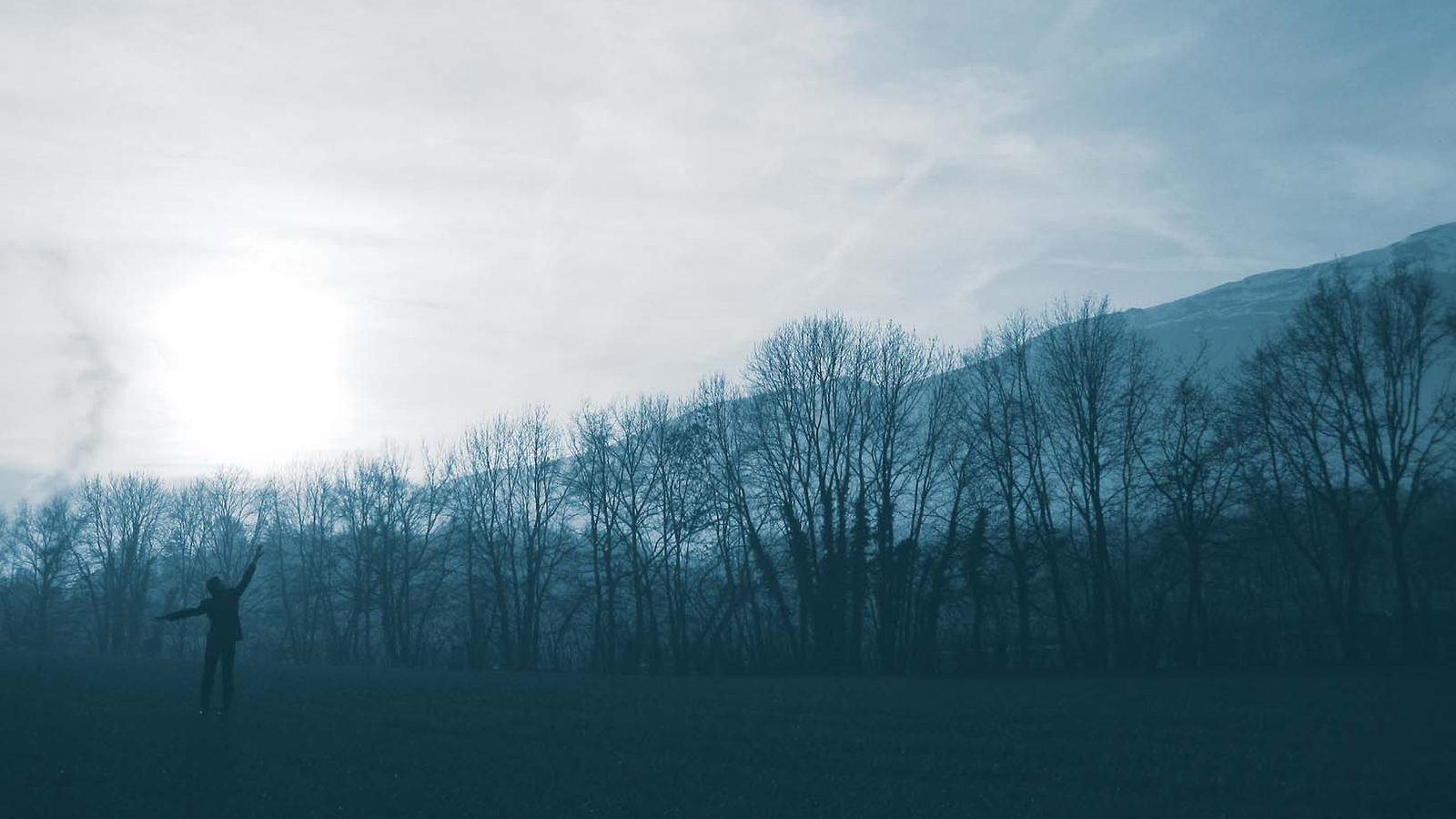 Dancer Ben Wegman blends into the evening fog on the CERN campus