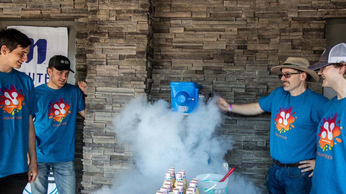Liquid nitrogen icream being made by volunteers. 