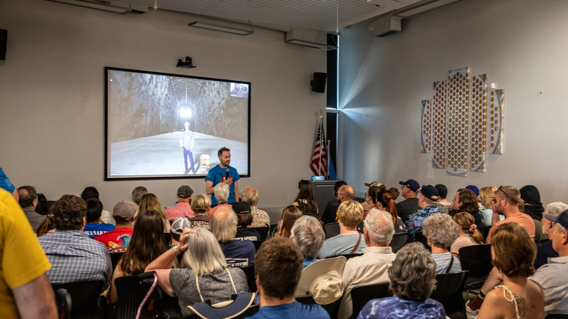 The crowd gathered for the live feed from underground during Neutrino Day.