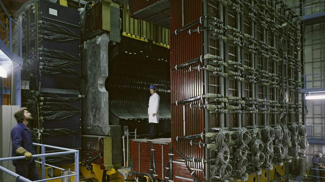 The magnet and hadron calorimeter are shown during their installation in the underground 'garage' ECA5 in LSS5.