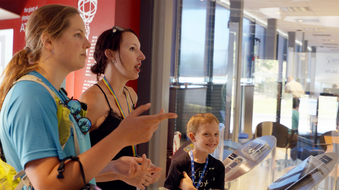 Sarah and Claire talk outside the ATLAS control room.