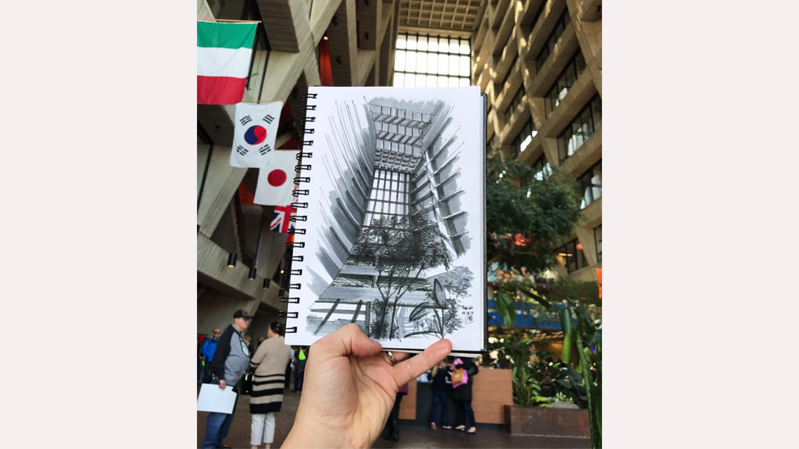 Sketch of interior of Wilson Hall atrium held up in Wilson Hall atrium