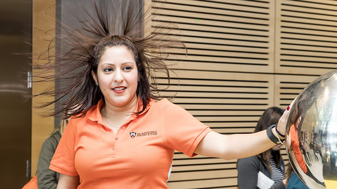 Photo at the 2017 CUWiP at Princeton, attendees had the opportunity to touch a Van de Graaff generator