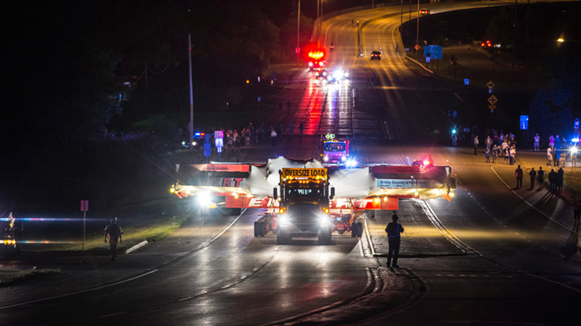 Photo showing Muon g-2 electromagnet was slowly driven through Lemont, Illinois, on July 23 while local residents watched