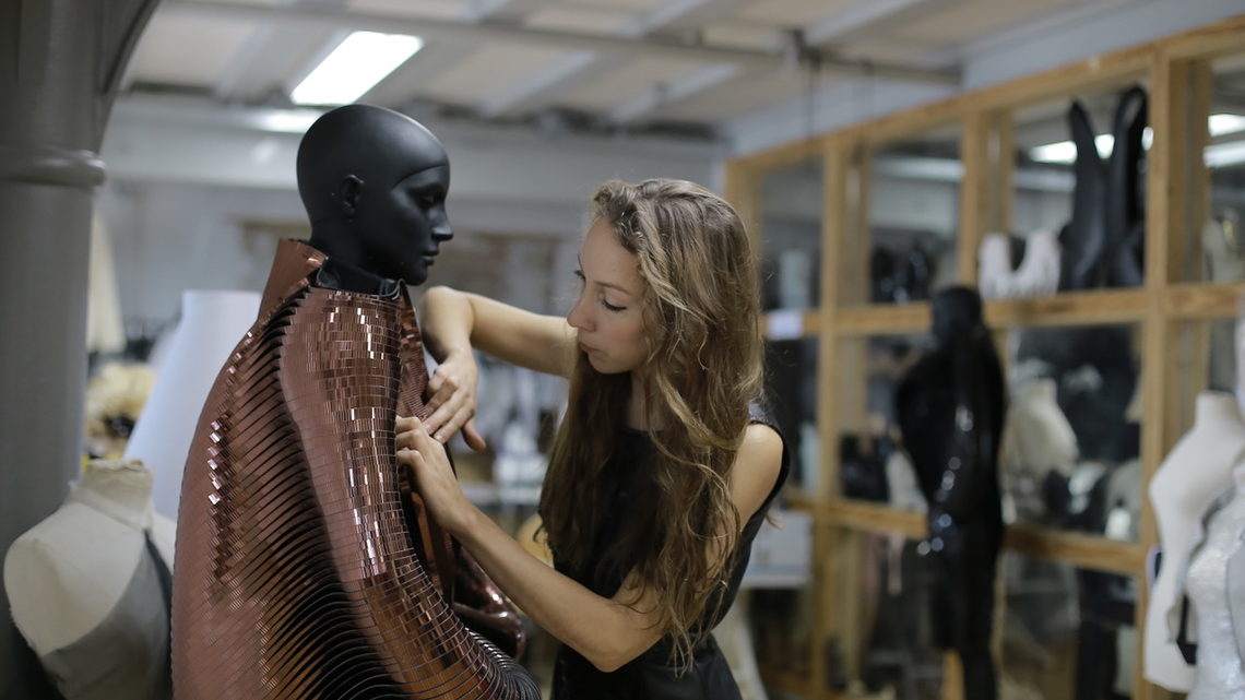 Iris working in the atelier