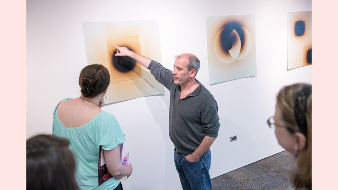 Nadel discusses his photo in the gallery