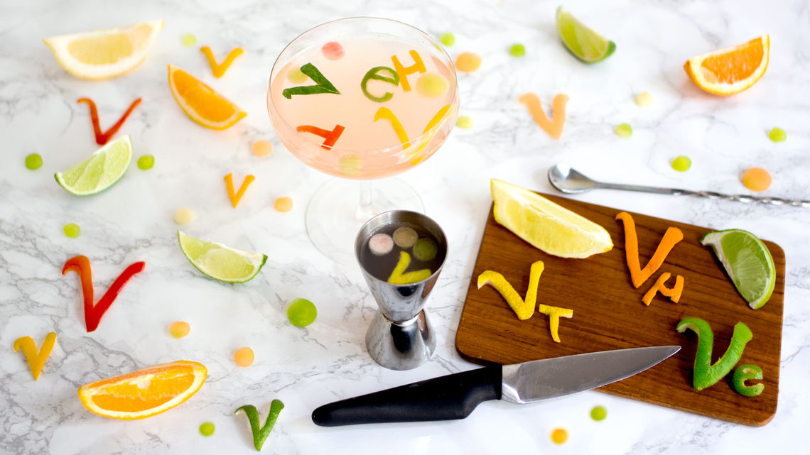 Neutrino cocktail with cutting board of tau, muon, and electron neutrino symbols