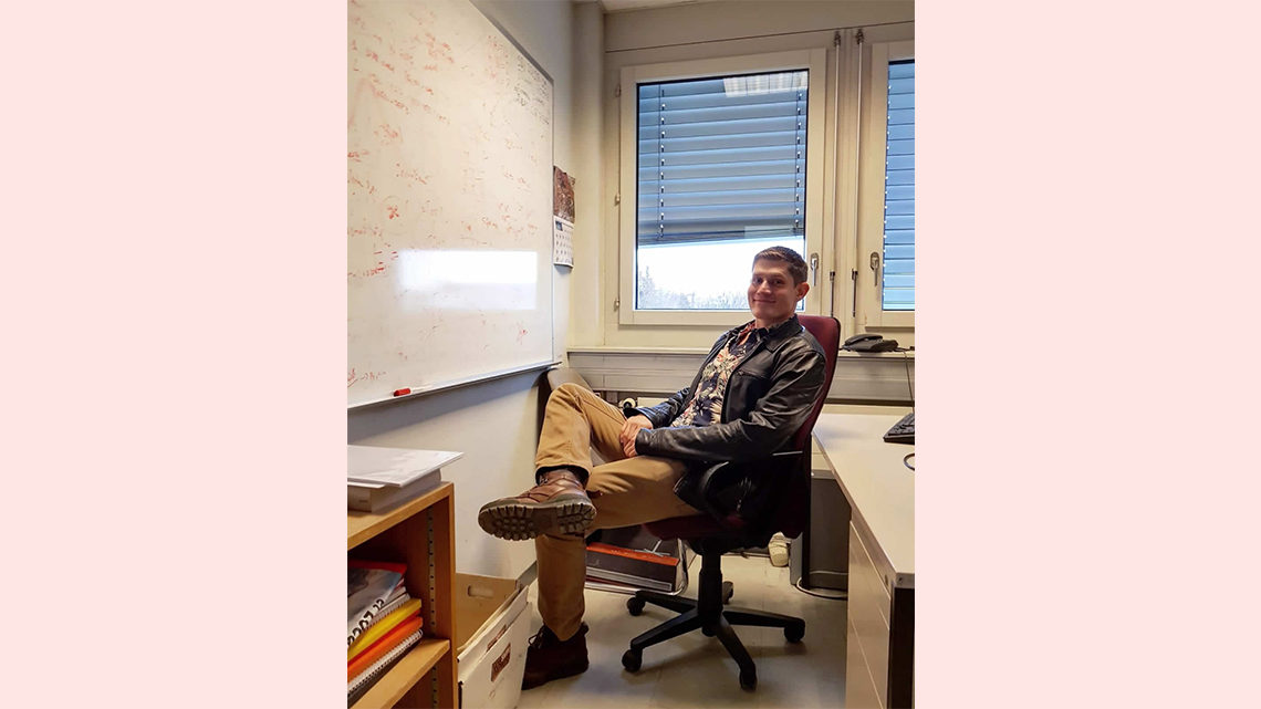 Pasner near a whiteboard at CERN