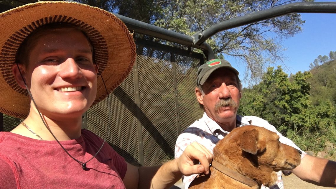 The Pasners with their dog on the farm