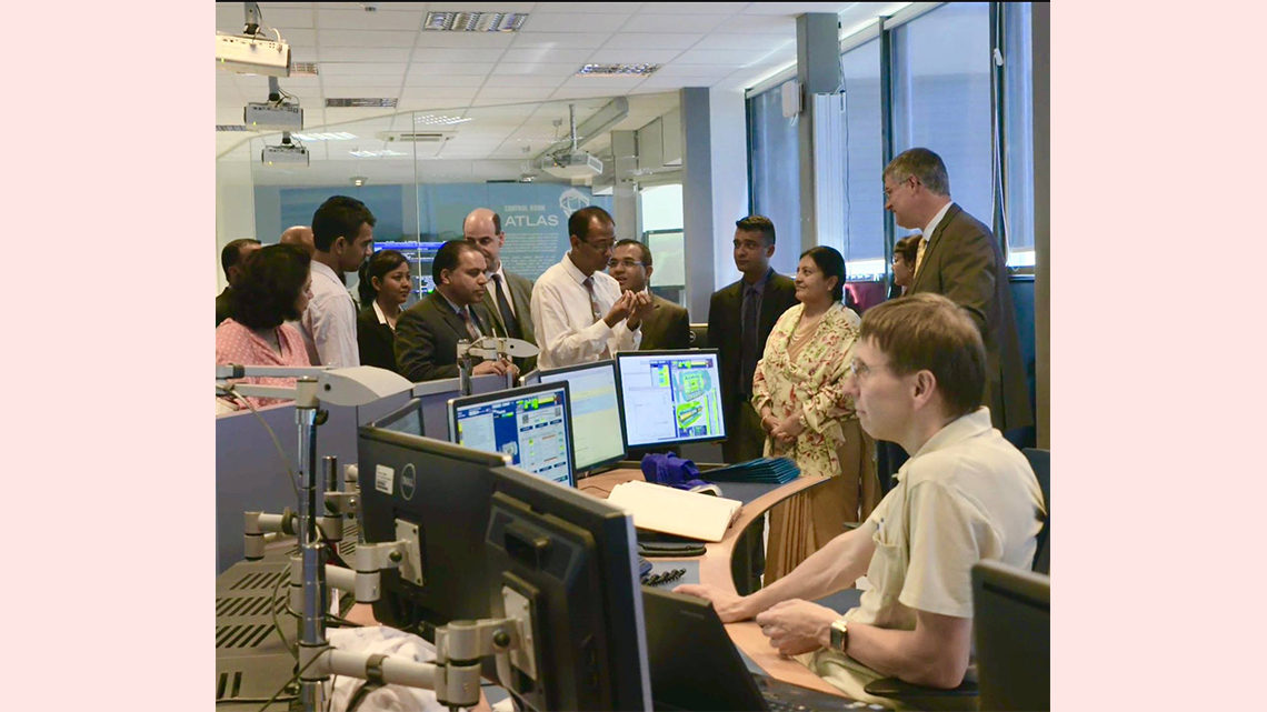 Photo of scientists speaking with the president of Nepal