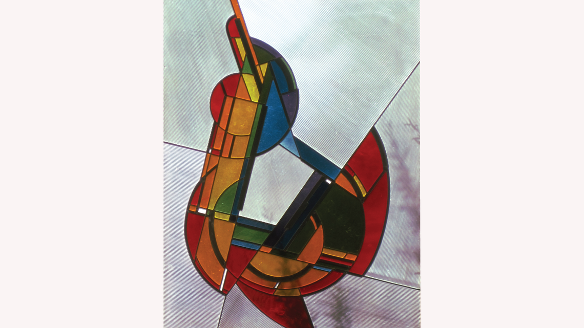 Stained glass 'and Man Created the Universe'