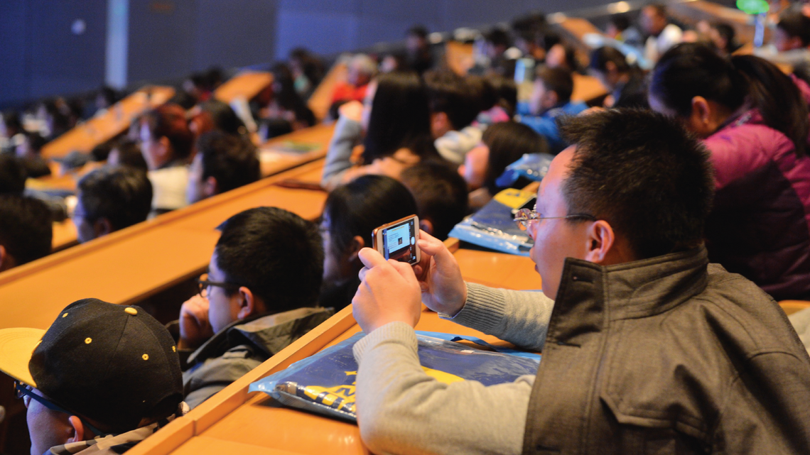Photo of the event included talks by four experts and a showing of the film “Phantom of the Universe”