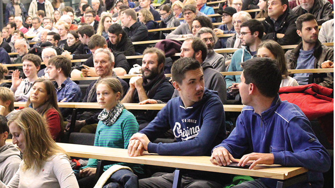 Photo of NTI lecture hall on Campus South filled to the last seat and no standing room was available
