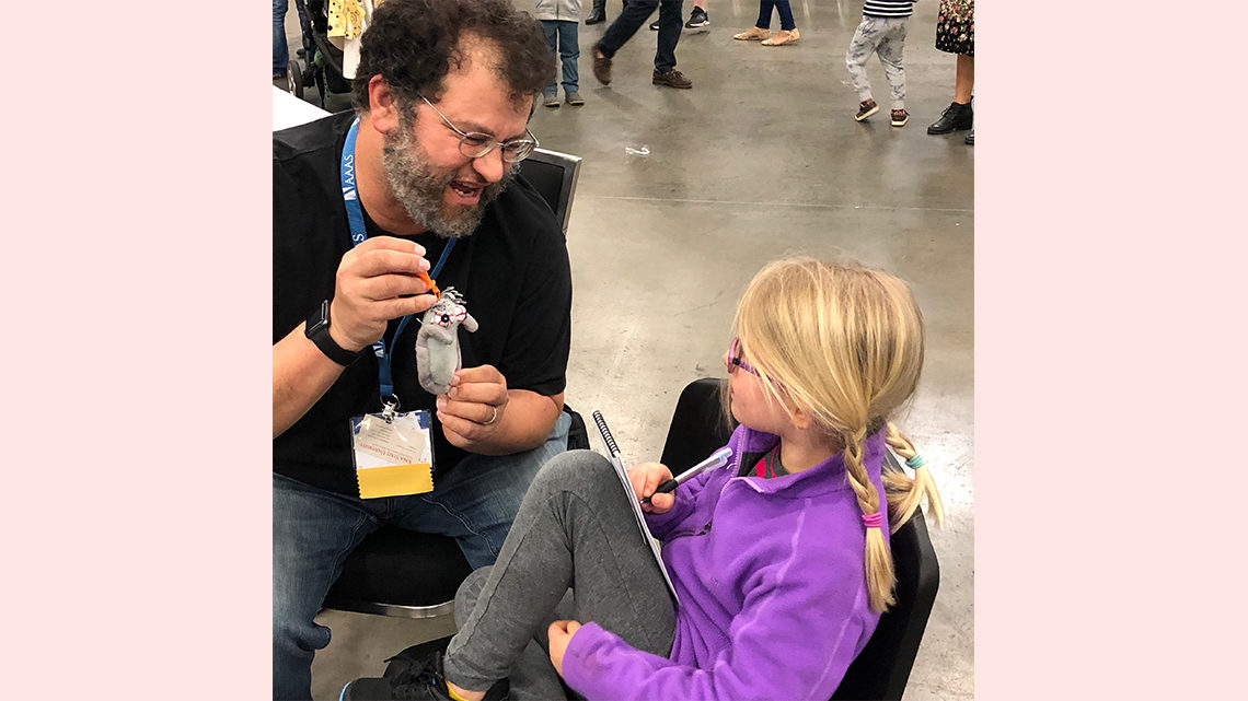 Scientist enthusiastically answered a child's question