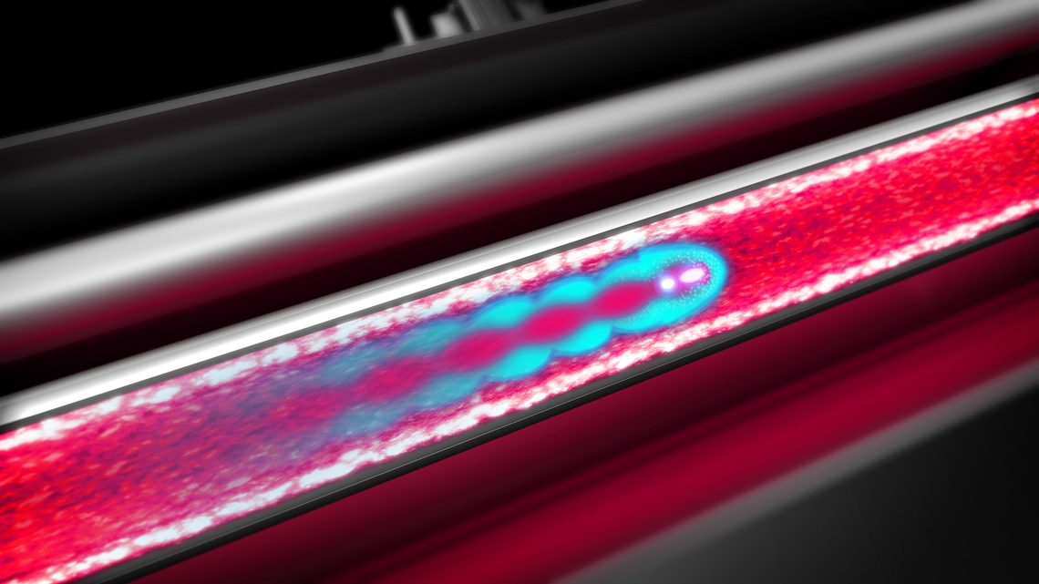 Illustration of a beam of particles passing through ionized gas in a beampipe