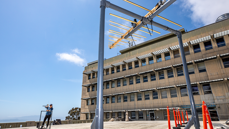 Researcher Kaja Rotermund makes adjustments to the LuSEE-Night test antenna at Berkeley Lab