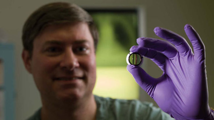 Photo of man holding acc app valve
